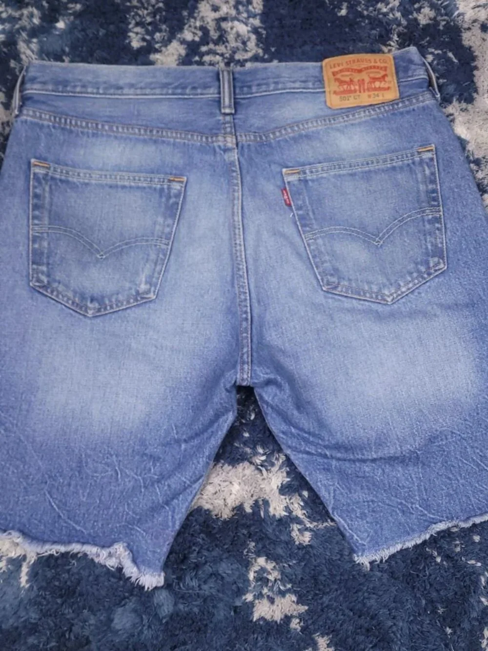 Levi 501 cutoff fringe blue denim shorts jorts